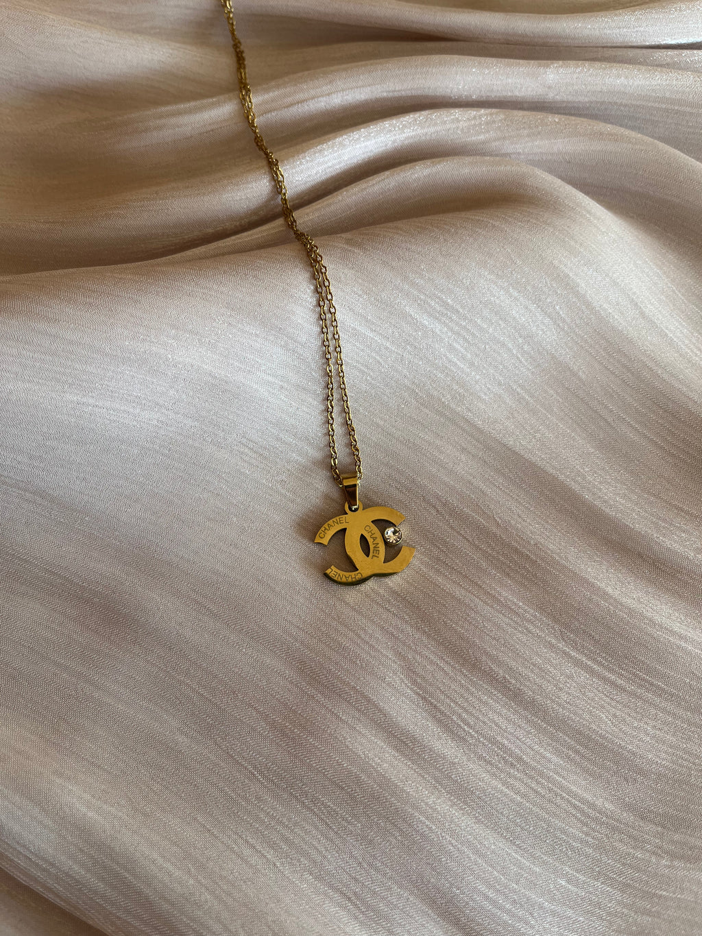 Chanel logo pendant