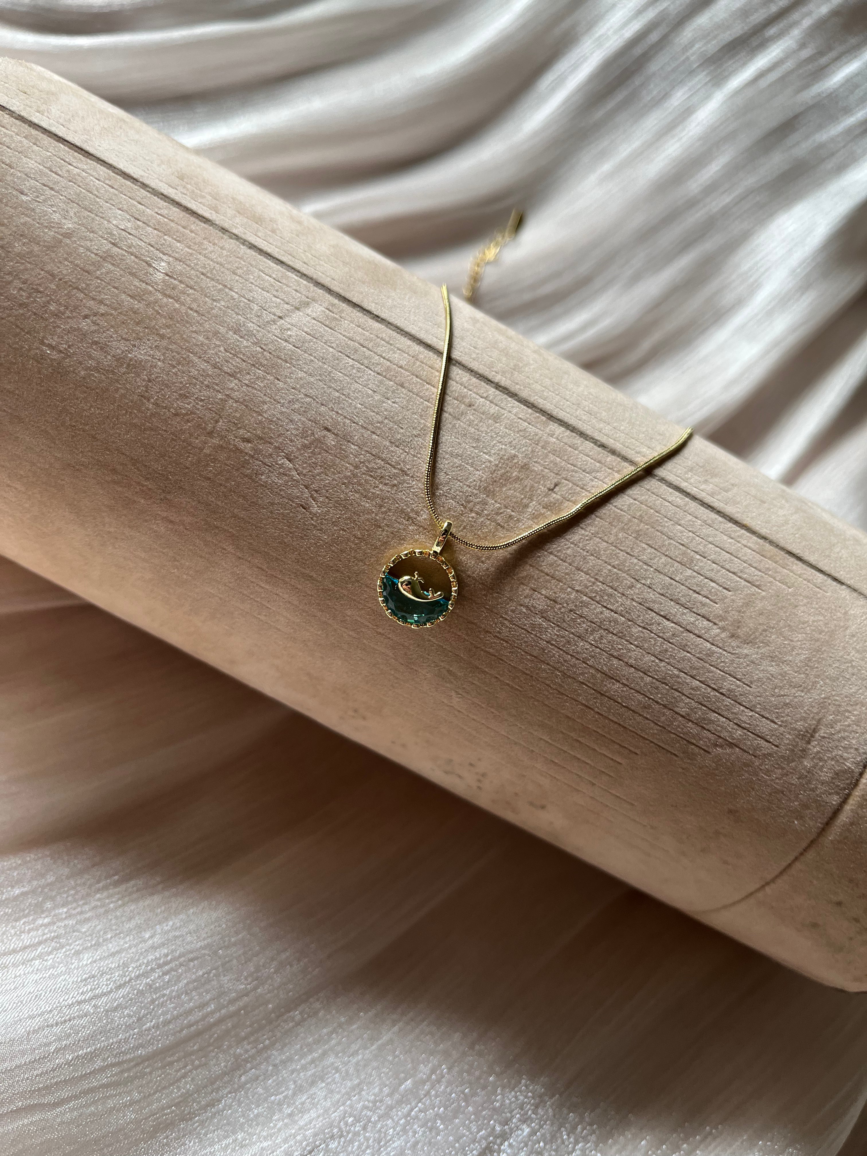 Gold Dolphin and Teal Gemstone Necklace